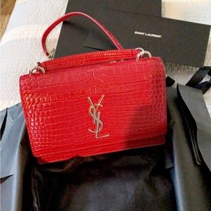 Saint Laurent
Women's Red Crocodile-embossed Sunset Bag